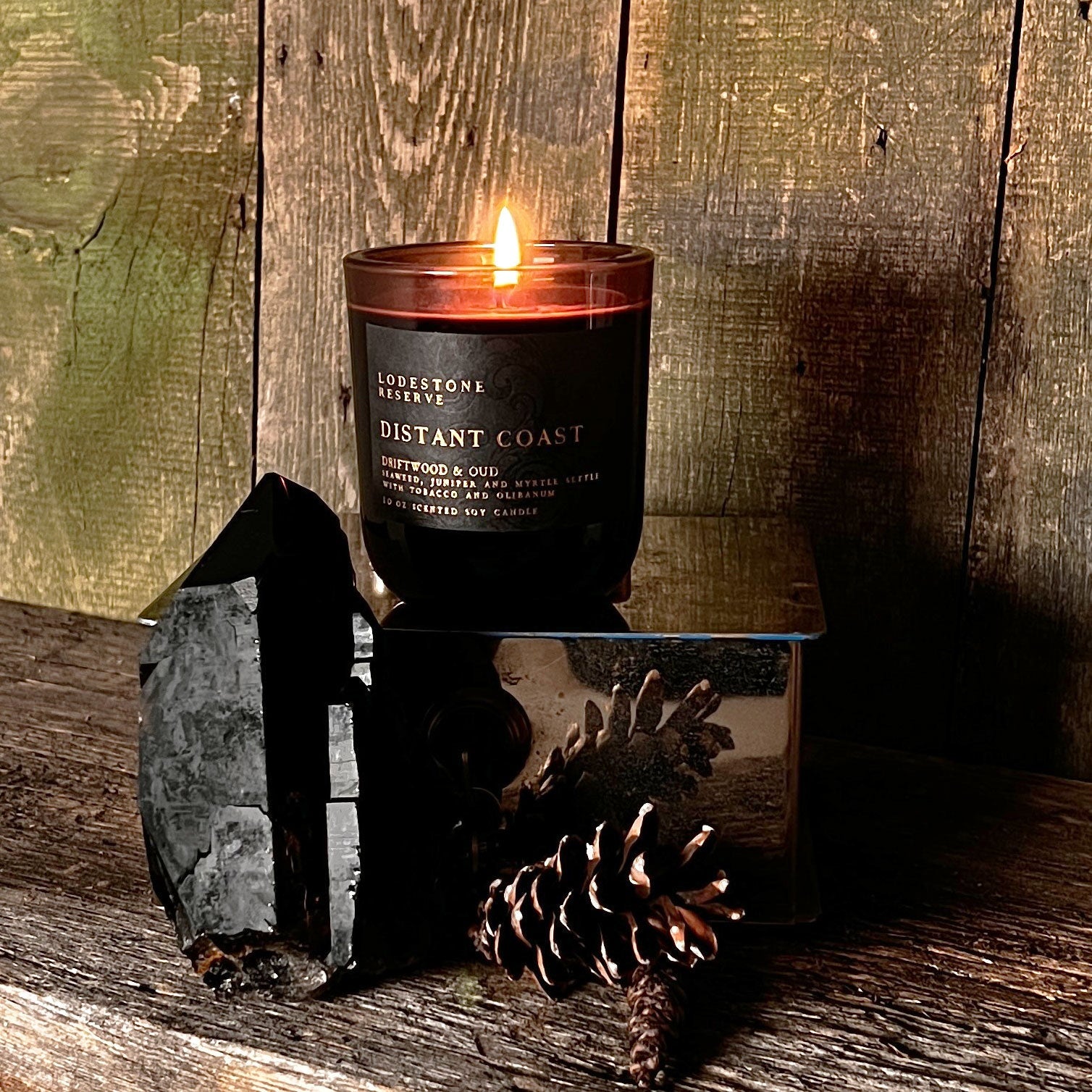 Lodestone Distant Coast candle with ocean breeze, driftwood, and tobacco.