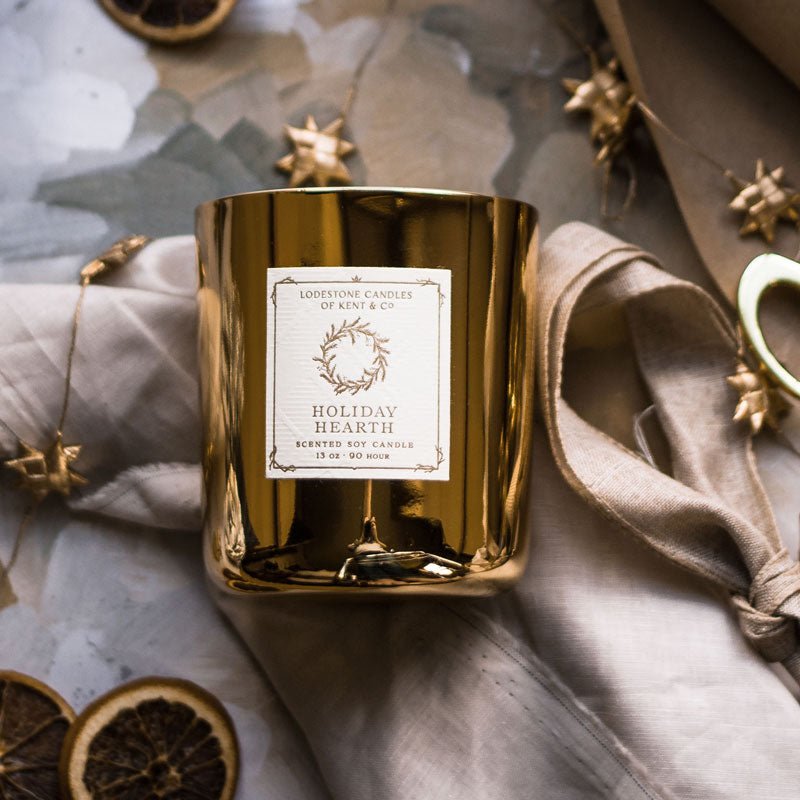 Lodestone Candles Holiday Hearth candle with ginger, orange, and pine.