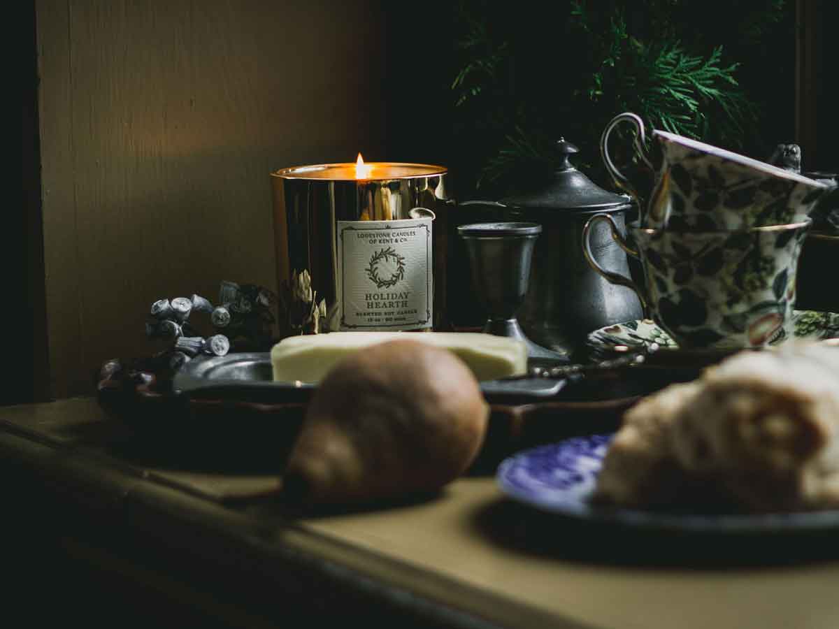 Lodestone Candles Holiday Hearth candle with ginger, orange, and pine.