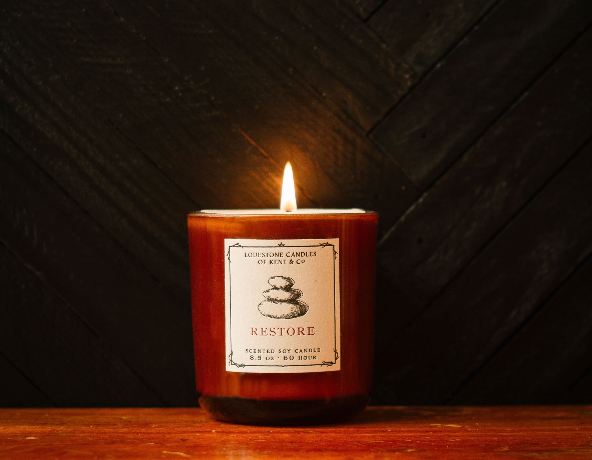 Lodestone Candles Restore soy wax candle with vetiver, eucalyptus, and vanilla.