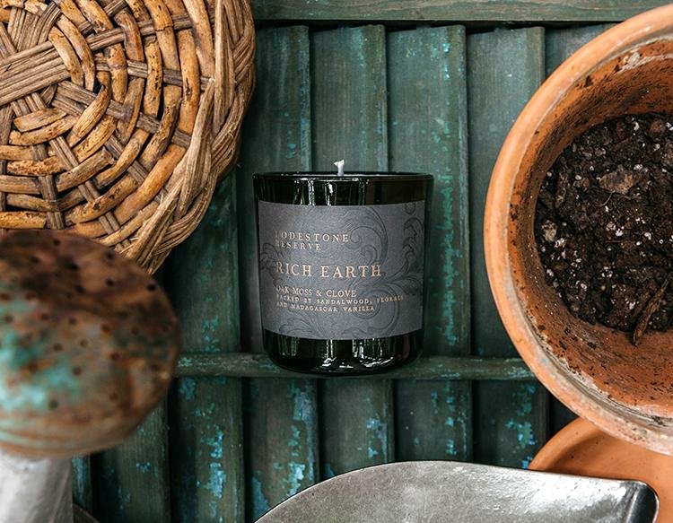 Lodestone Candles Rich Earth candle with cinnamon, clove, florals, oak moss, sandalwood, and Madagascar vanilla.