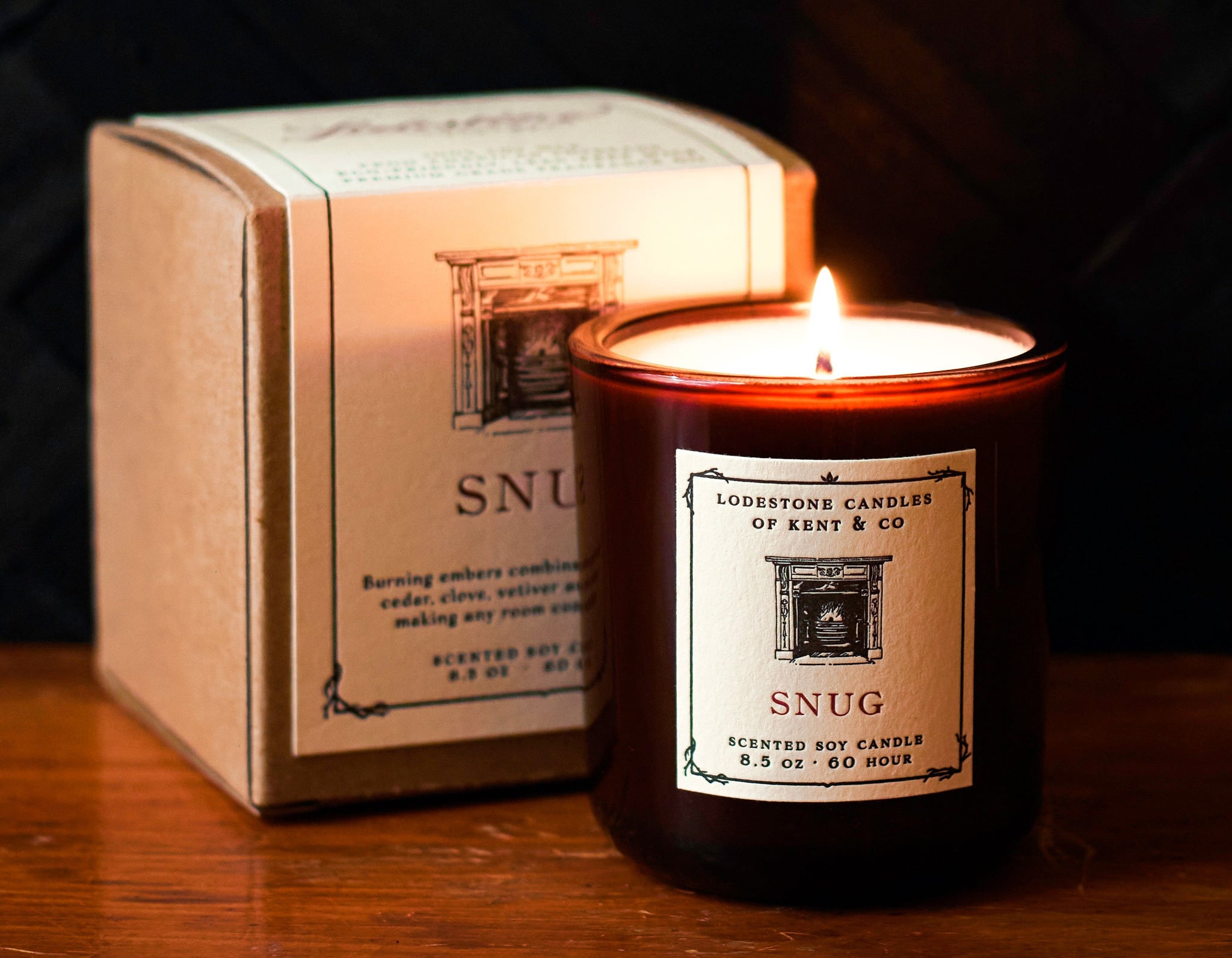Lodestone Candles Snug candle with cedar, vetiver, and dark amber.