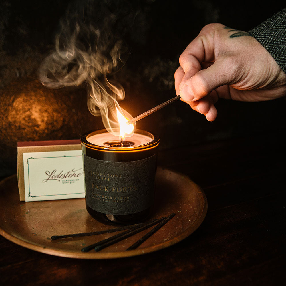 soy wax candle and match