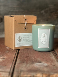 Lodestone Candles scent profile featuring top notes of green galbanum and geranium leaf, a heart of orris, and a base of heliotrope.