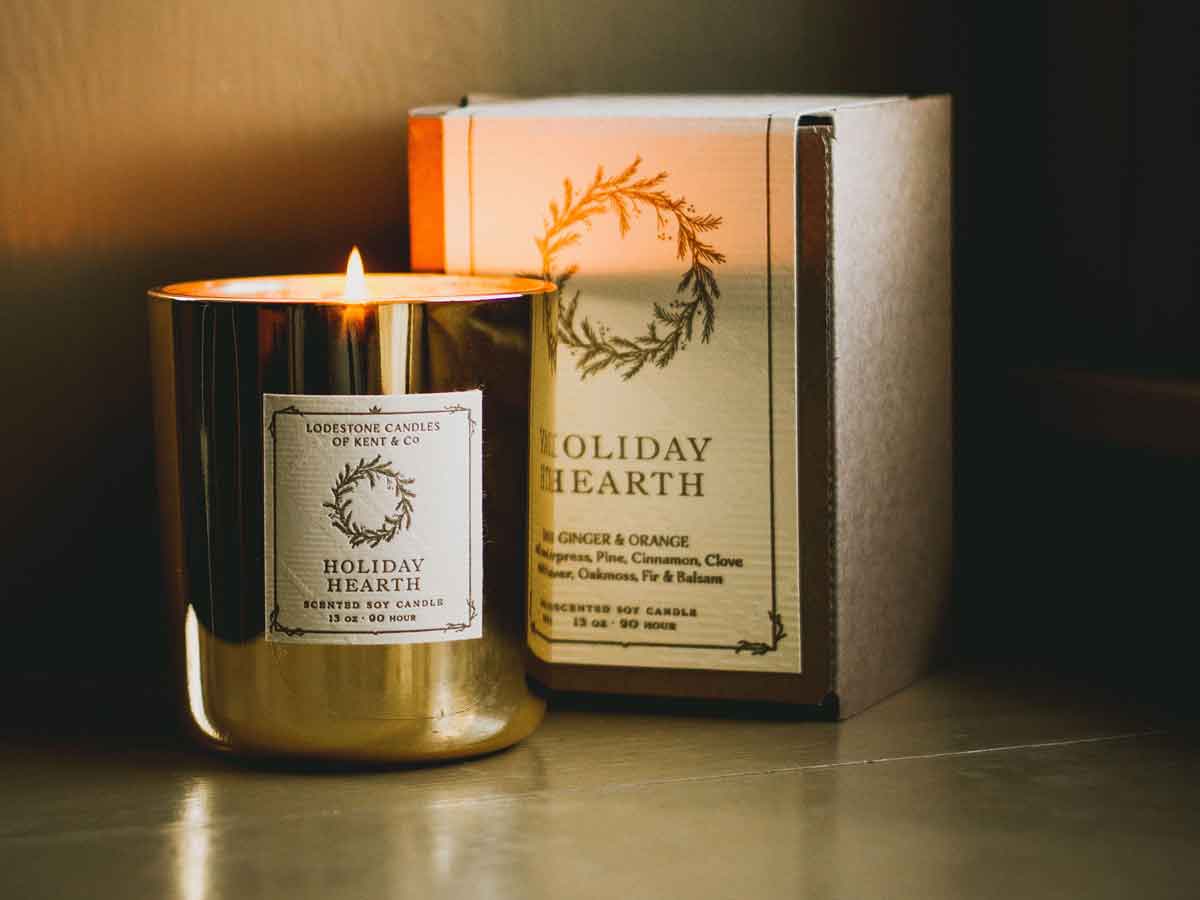 Lodestone Candles Holiday Hearth candle with ginger, orange, and pine.