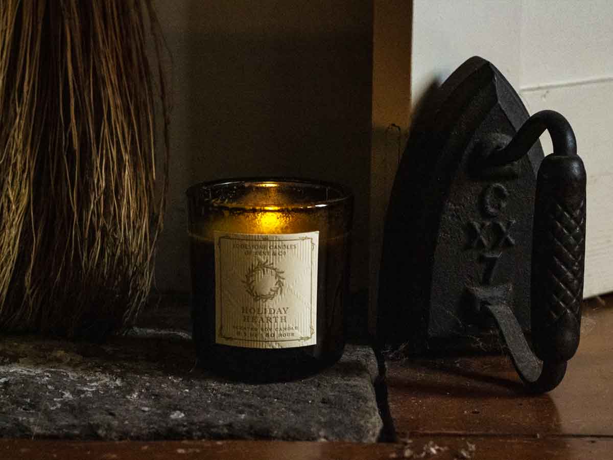 Lodestone Candles Holiday Hearth candle with ginger, orange, and pine.