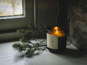 Lodestone Candles Holiday Hearth candle with ginger, orange, and pine.