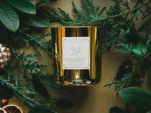 Lodestone Candles Winter Berry & Cypress candle with eucalyptus and fir.
